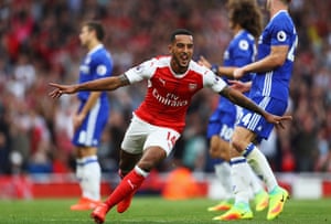 Theo Walcott of Arsenal celebrates scoring his sides second goal.