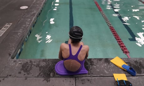 A proposed ban on transgender athletes playing female school sports in Utah would affect transgender girls like this 12-year-old swimmer seen at a pool in Utah on Monday, Feb. 22, 2021. She and her family spoke with The Associated Press on the condition of anonymity to avoid outing her publicly. She cried when she heard about the proposal that would ban transgender girls from competing on girls’ sports teams in public high schools, which would separate her from her friends. She’s far from the tallest girl on her team, and has worked hard to improve her times but is not a dominant swimmer in her age group, her coach said. “Other than body parts I’ve been a girl my whole life,” she said. (AP Photo/Rick Bowmer)