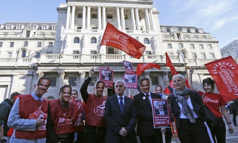 The shadow chancellor, John McDonnell, joins the Unite strikers donning Mark Carney masks outside the Bank of England.