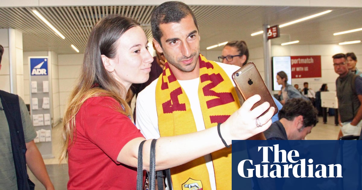 Arsenal’s Henrikh Mkhitaryan joins Roma in loan with option to buy