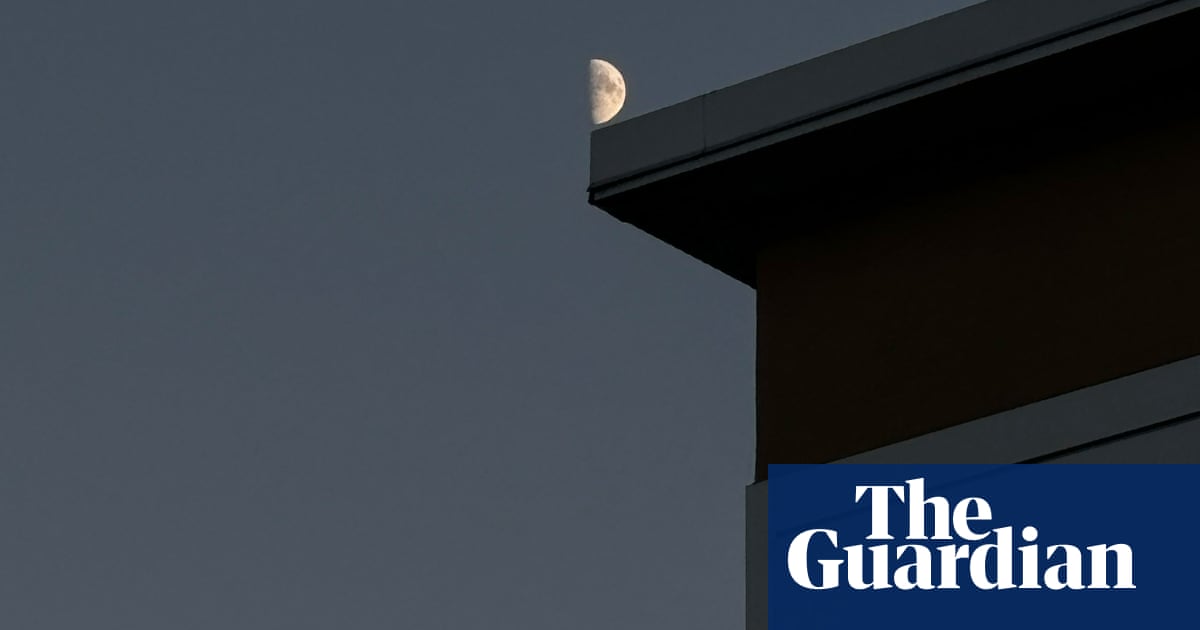 The moon came into view and I searched for the perfect place to stand': Eric Kogan's best phone photo