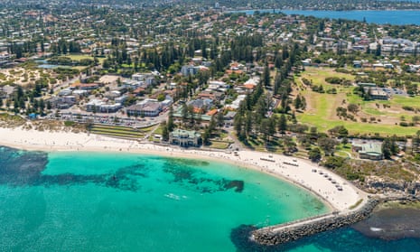 Aerial image of Cottesloe beach in Perth with the Swan River in the background