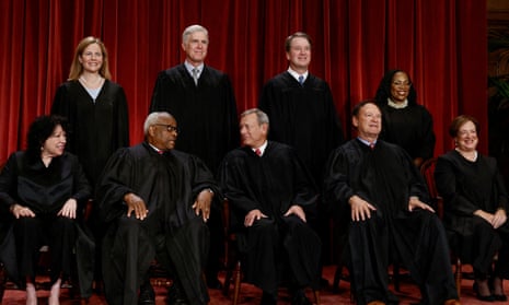 US supreme court justices pose in their robes