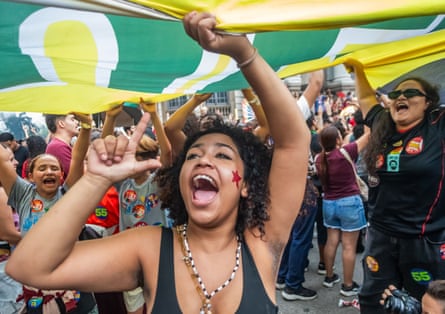 Brazilian students and activists march in downtown Rio de Janeiro to support Lula and protest against the far-right candidate, Flávio Bolsonaro