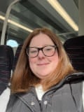 Lucy, on a train