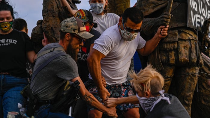 Armed Vigilantes Under Scrutiny After Statue Protester Shot In New