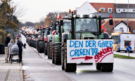 Farmers take part in a demonstration against the Danish government’s order to cull all the country’s farmed mink.