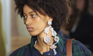 Models present creations from the Burberry collection during a catwalk show for the Spring/Summer 2018