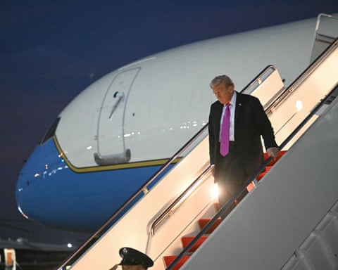Donald Trump steps off Air Force One upon arriving at Joint Base Andrews in Maryland