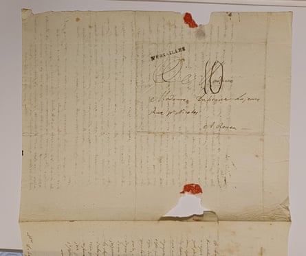 An old handwritten letter from Jean-André Mongez, with faded ink, a red wax seal and torn edges