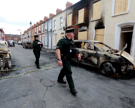 Number of arrests after riots in Northern Ireland rises to 19 - The Guardian