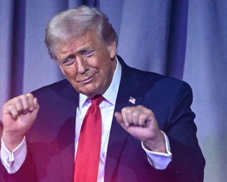 Donald Trump reacts after the results of the draw for the 2026 World Cup