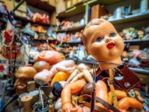 Each doll has its own story, like the doll dropped and lost as a child fled with its parents as German soldiers invaded France during the second world war