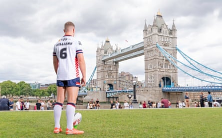 George WIlliams aims a kick at Tower Bridge.