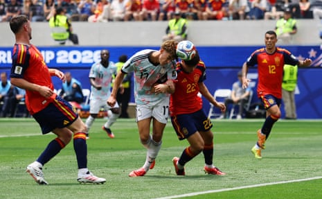 Belgium's Charles De Ketelaere heads home to equalise against Spain.