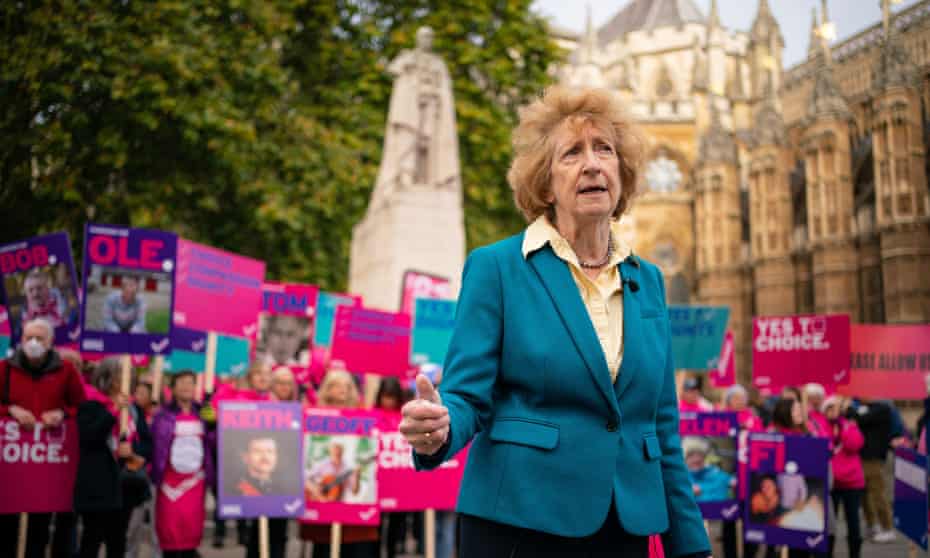 Baroness Meacher joins demonstrators during a protest outside the Houses of Parliament to call for reform to assisted dying legislation.
