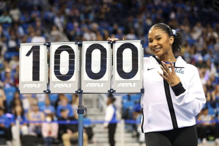 Jordan Chiles of the UCLA Bruins poses with her perfect score after she earned a 10 on floor exercise against the Arizona State Sun Devils at Pauley Pavilion on 11 February 2023.