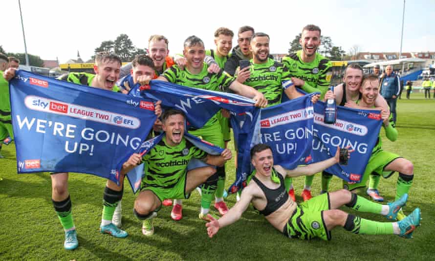 Forest Green players celebrate their promotion to League One in April