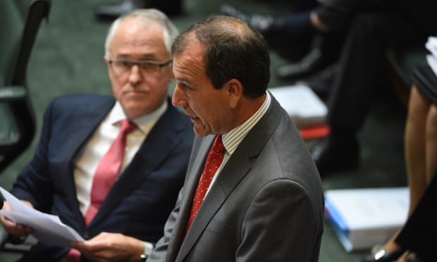 Malcolm Turnbull listens as Mal Brough answers questions on Wednesday.