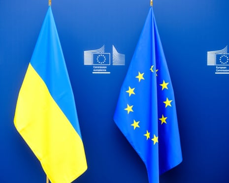 The Ukrainian and the EU flags are seen side by side in the Berlaymont, the EU Commission headquarter in Brussels, Belgium.