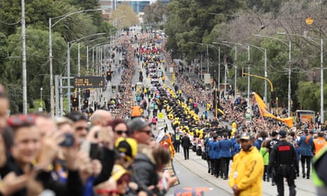 Fans lining the parade route during the 2019 AFL grand final parade on 27 September 27 2019 in Melbourne, Australia.