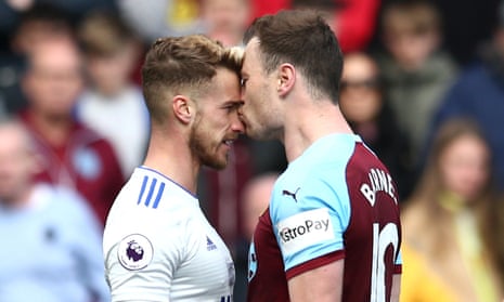 Ashley Barnes of Burnley kisses Joe Bennett of Cardiff City as they clash.