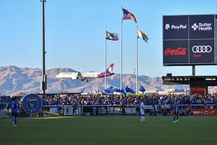 A Hawaiian Airlines jet lands at San Jose international airport during a game between LA Galaxy and San Jose Earthquakes in 2021.