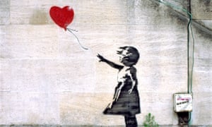 Banksy girl with red balloon on a South Bank wall near the National Theatre, London England UK