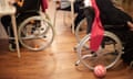 senior women sitting in wheelchairs in a nursing home