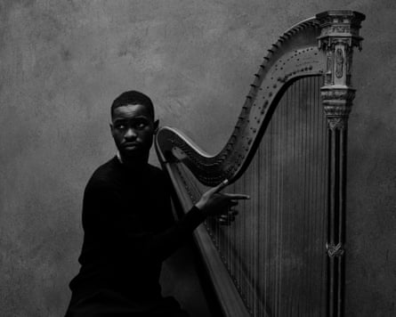 The musician Dave with a harp.