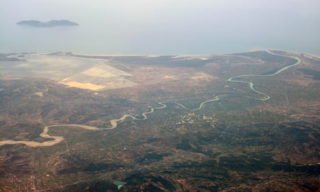Aerial view of the Vjosa as it meets the sea. The new national park does not cover the river’s delta, where a new airport is planned.