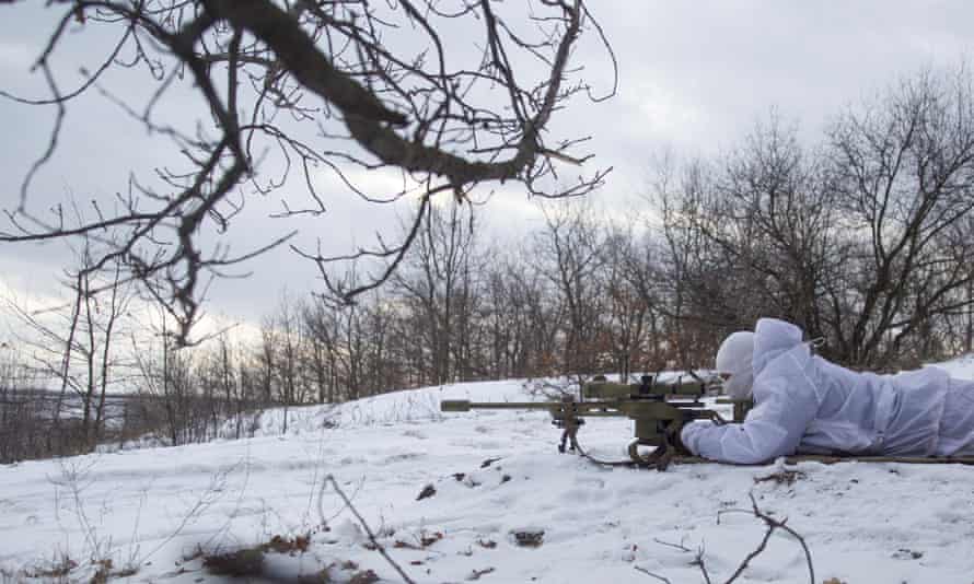 A Ukrainian sniper training in the Donetsk region on 17 January.