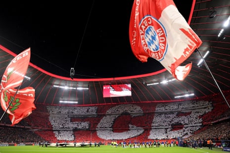 A general view inside the stadium as FC Bayern Munich fans form a TIFO reading "FCB", prior to the UEFA Champions League round of 16 leg two match between FC Bayern Munich and Paris Saint-Germain at Allianz Arena.