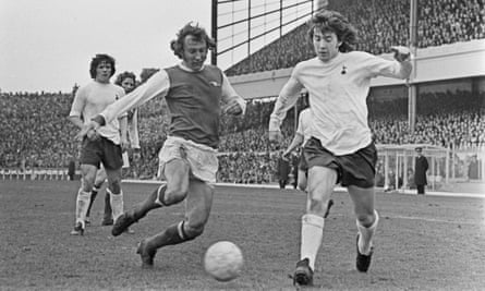 Joe Kinnear, right, playing for Spurs, with Bob McNab of Arsenal, during a First Division match at Highbury stadium, April 1973.
