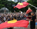 News live: Invasion Day rallies under way around Australia; Sydney beaches close after shark sightings