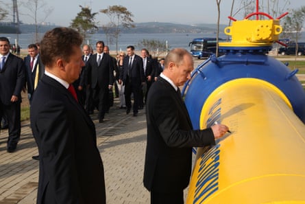 Vladimir Putin and Alexei Miller, CEO of Russian natural gas giant Gazprom, attend a ceremony to mark the launch of the Sakhalin-Khabarovsk-Vladivostok natural gas pipeline in 2011.