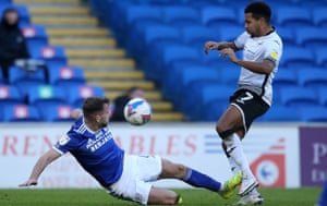 Cardiff’s Joe Ralls fouls Korey Smith of Swansea