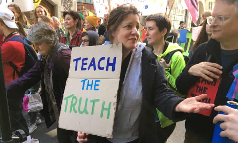 Teachers protest outside the Department for Education in London against what they say is the government’s lack of action on climate change