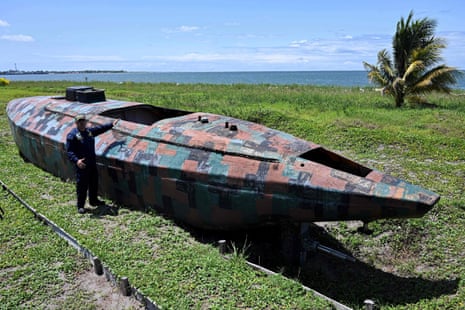 Dager displays a camouflaged homemade narco-submarine
