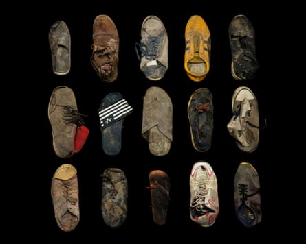 Gideon Mendel lined up footwear abandoned or lost by child refugees.