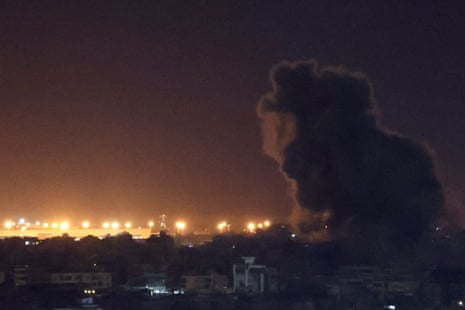 Smoke rises over Beirut's southern suburbs after a strike.