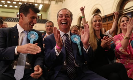 Brexit party leader Nigel Farage (centre) celebrates being elected to the European parliament.
