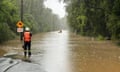 Rescue crews in action during flooding in Woollamia, NSW