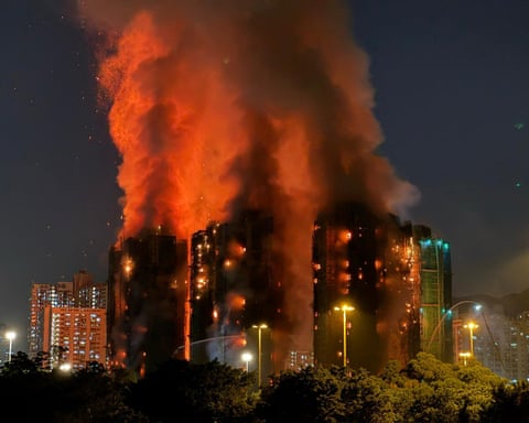 Thick smoke and flames rise as a major fire engulfs several apartment blocks at the Wang Fuk Court residential estate in Hong Kong's Tai Po district on Wednesday.
