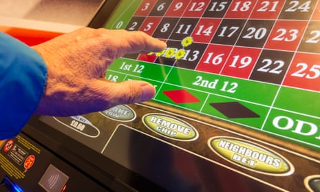 A person using a fixed-odds roulette machine