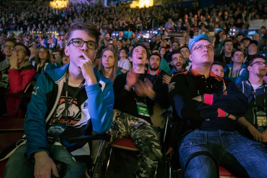 Fans watching a killing in the game on the big screens during the Intel Extreme Masters Counter-Strike eSports tournament at Katowice’s Spodek Arena in March 2017.