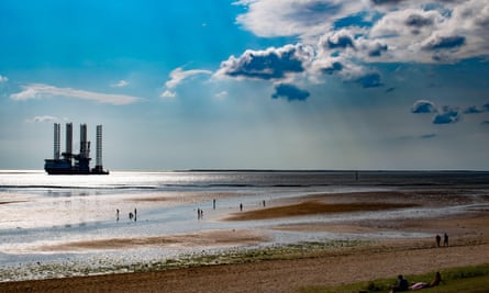 Panorama of Esbjerg oil harbor, Denmark, oil rig on the shore of Nord see, summer 2019.