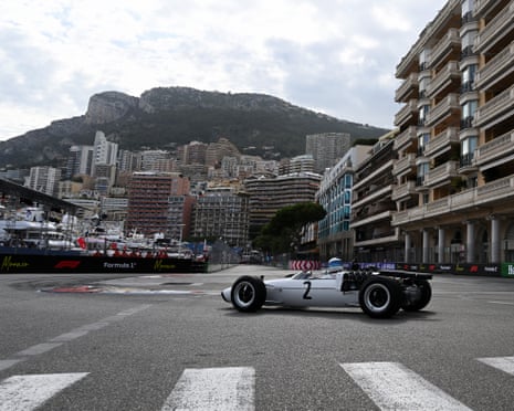 Mika Häkkinen drives in McLaren’s first car, the M2B, with the view of the Monte Carlo central ward behind him during previews ahead of the F1 Monaco Grand Prix