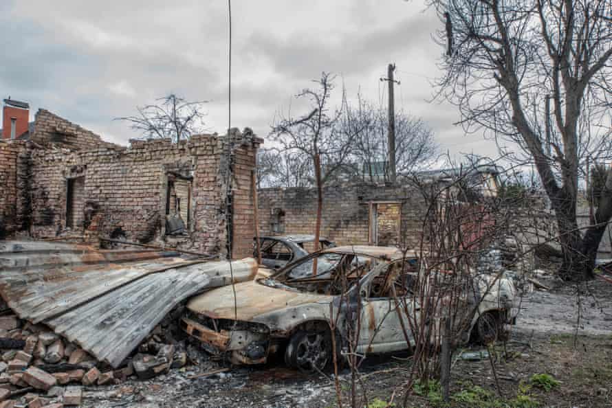 Buildings and cars destroyed in Bucha.
