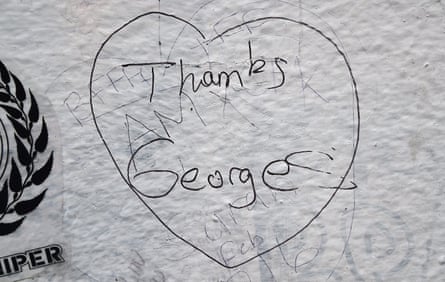A message of thanks to the late Beatles producer George Martin is scribbled on a wall outside the famous Abbey Road Studios in London, Britain, 9 March 2016.